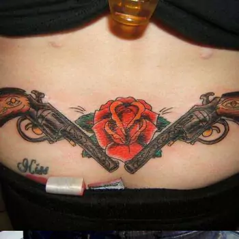 guns-and-roses-tramp-stamp-tattoo