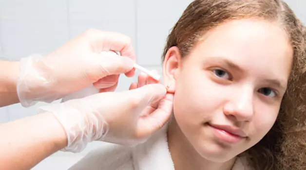 What are the solutions for crusty old ear piercings